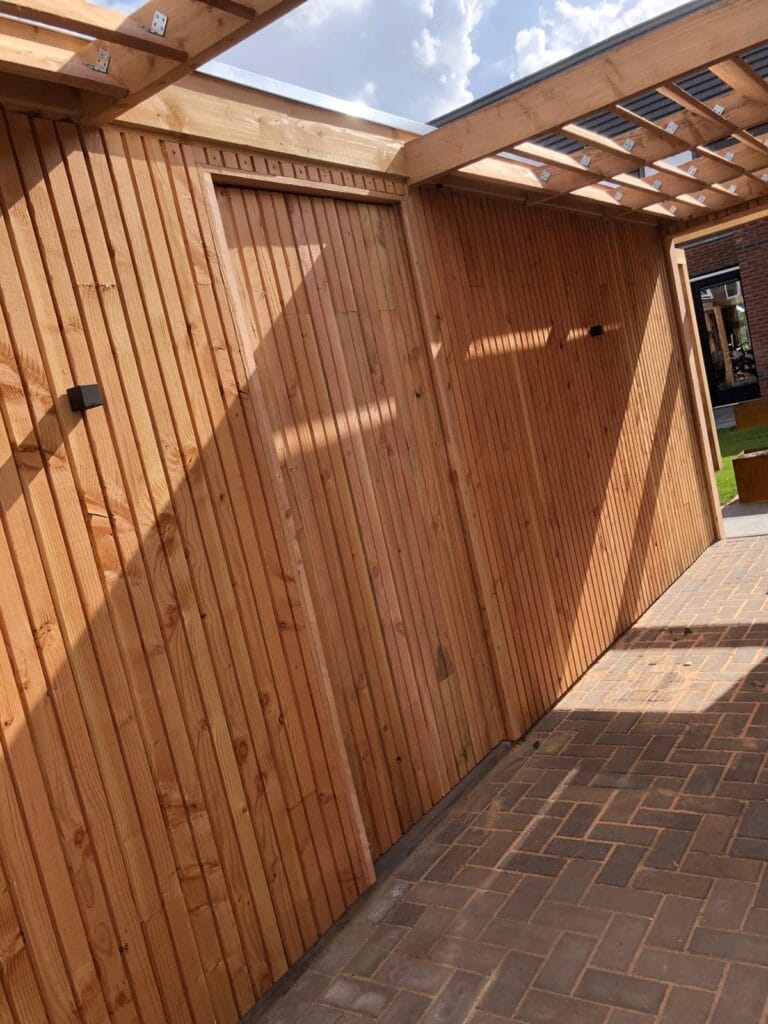 Houten berging gevelbekleding